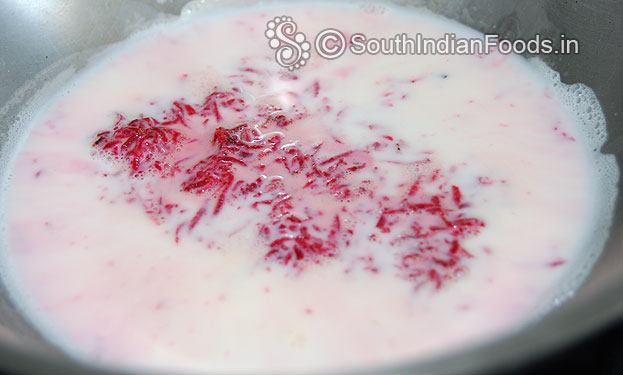 Add milk, let it boil and cook till the milk is reduced by half