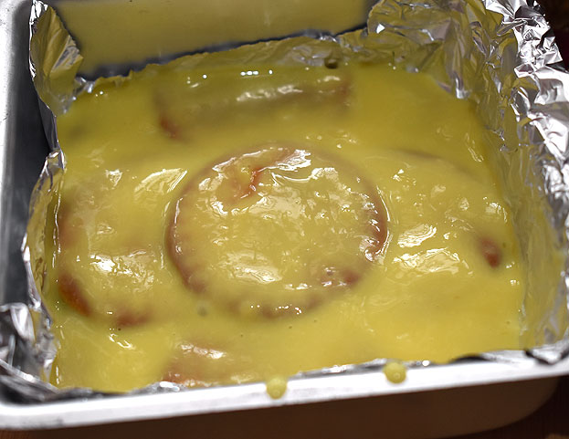 Add custard, spread over the biscuit