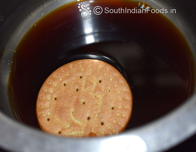 Dip biscuit in coffee mixture