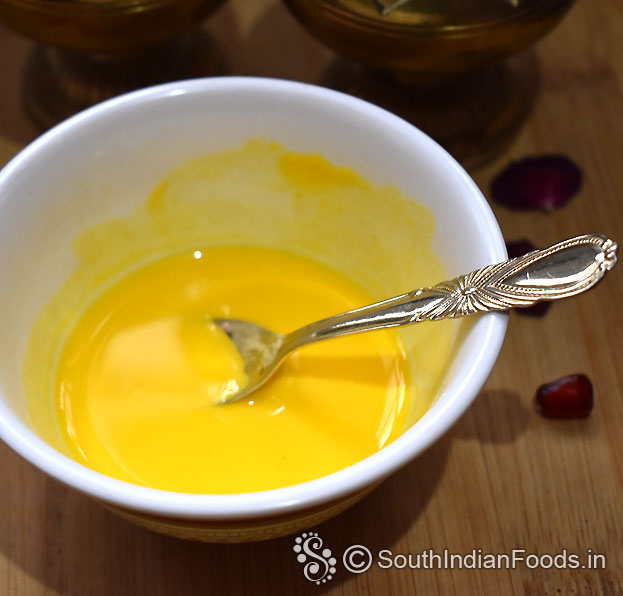 In a bowl add custard powder, 200 ml milk mix well