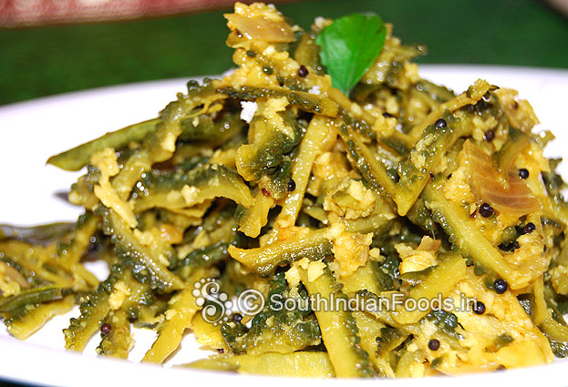 Transfer pavakkai poriyal to a plate serve hot with rice.