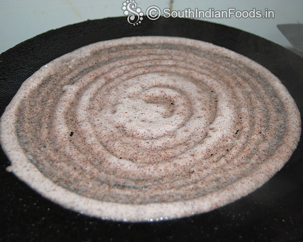 Heat iron dosa tawa, pour batter