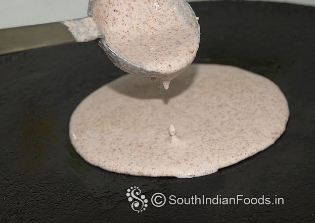 Heat iron dosa tawa, pour batter