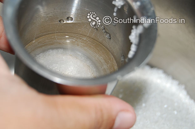Add half cup water & let it boil till half string consistency