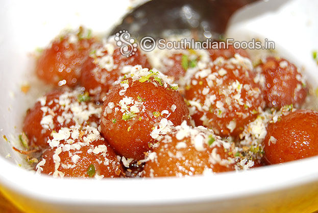 Sprinkle grated almonds and pistachios