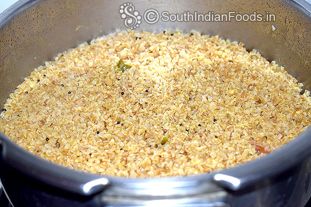 After 4 whistles, perfect broken wheat upma ready