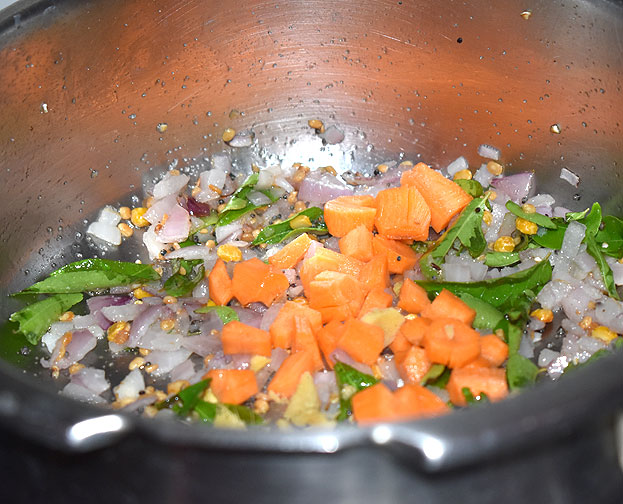 Add green chilli, ginger, carrot