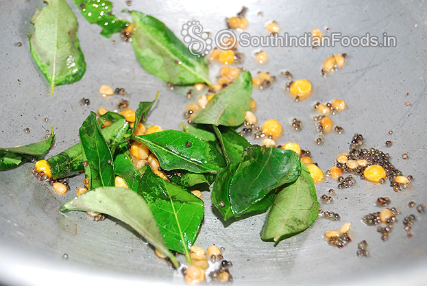 Heat oil in a pan add seasoning ingredients-mustard seeds, urad dal, bengal gram & curry leaves saute cut coof heat