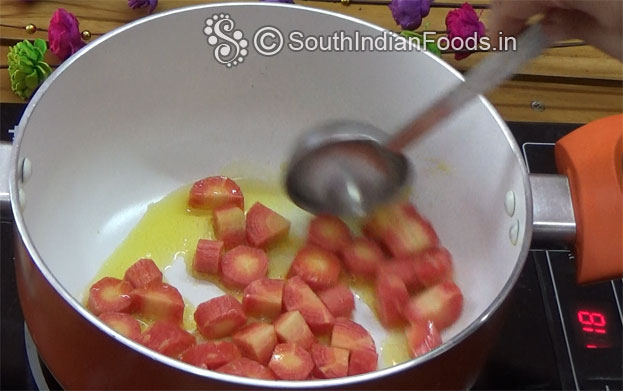 Heat 1 tbsp ghee, add almond, carrot for 3 min