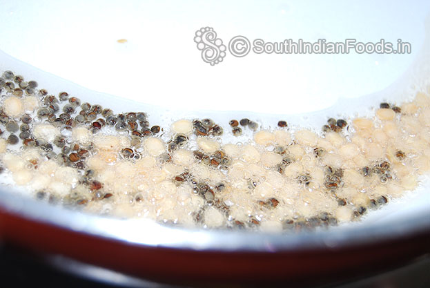 Heat coconut oil in a pan,  add mustard & urad dal