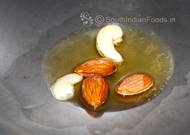 Heat pan, add ghee, roast almonds & cashews