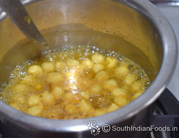 Add turmeric powder, salt & red chilli powder