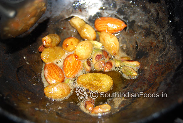 Heat ghee in a pan roast almonds, raisins, & pistachios then chop