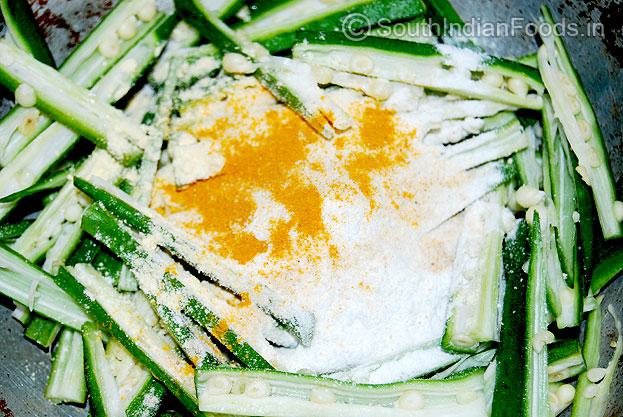 Okra, Besan flour, Rice flour, asafoetida, salt, turmeric powder & 3 tbsp of water