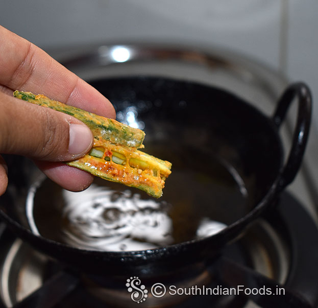 Heat oil, sprinkle okra pieces