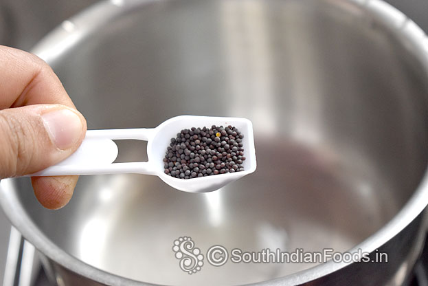 Heat 1 tbsp oil, add mustard seeds