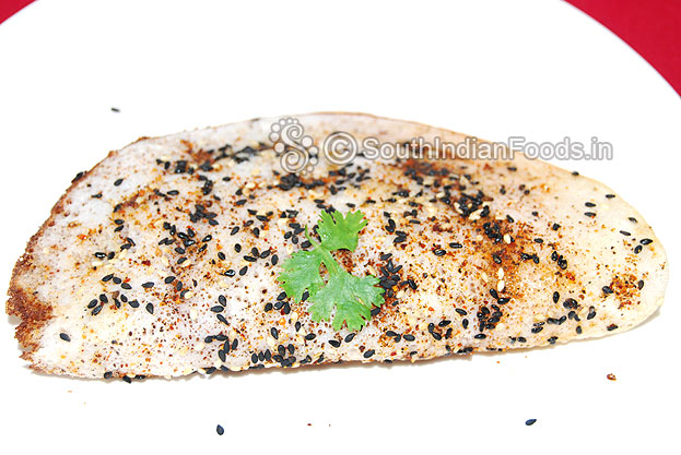 Dosa with sesame and idli podi topping
