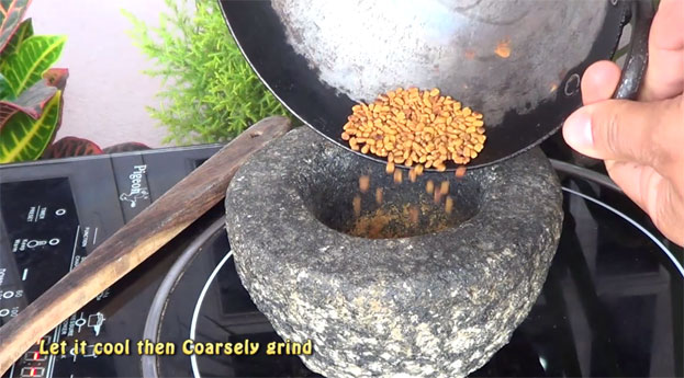 put it in a stone mortar, coarsely grind