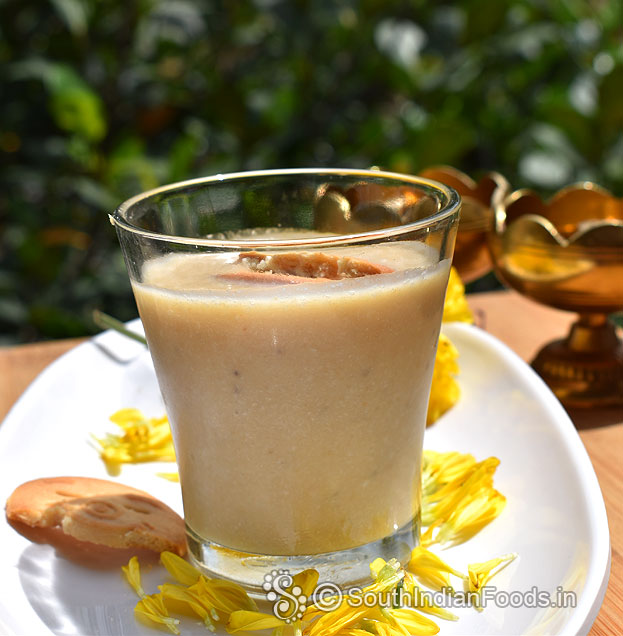 Breakfast banana milkshake with golden oreo ready, serve immediately
