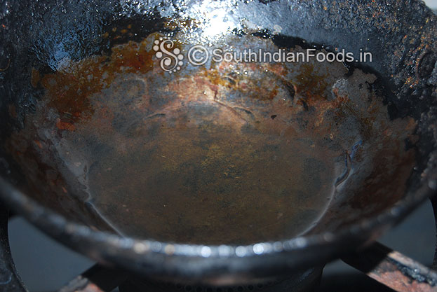 Heat 1/4 cup gingelly oil and let it cool