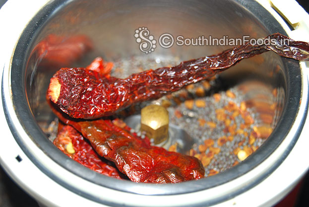In a mixer jar add dry roasted ingredients & grind to fine powder without water