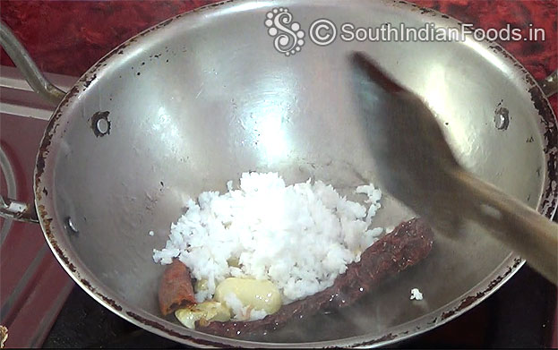 Add Coconut, roast till light brown