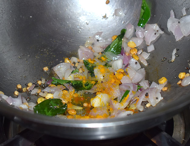 Add turmeric and red chilli powder