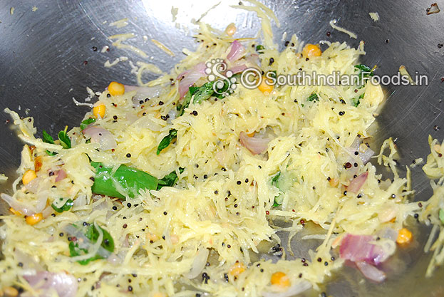Heat oil in a pan, add mustard, bengal gram, urad dal, green chilli, onion, ginger, curry leaves, & grated mango saute then add steamed semiya mix well