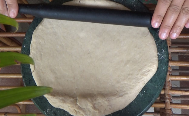 Sprinkle flour, roll out into thick circle