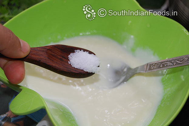 Add fresh curd in a bowl beat well,  then add salt