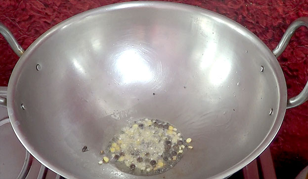 Heat oil, add mustard seeds, chana dal & urad dal