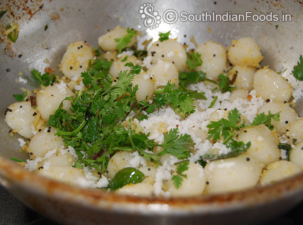 Finally add coriander leaves, coconut mix well & cut off heat