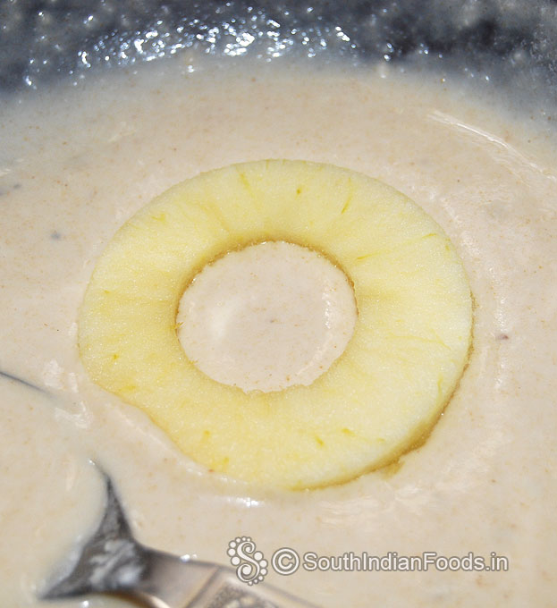 Dip apple rings in to the batter