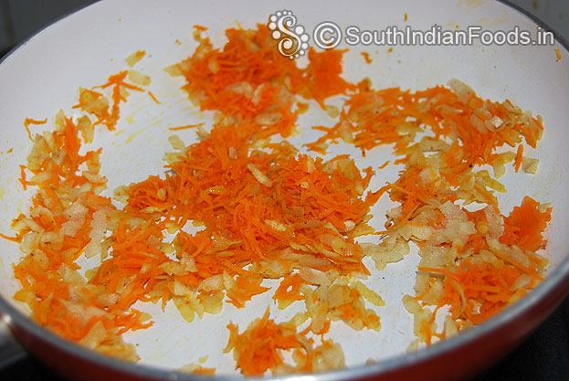 In the same pan add ghee, aval, carrot roast