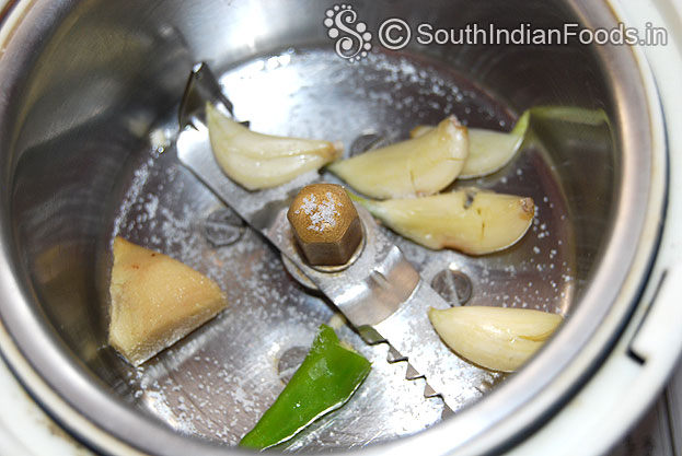 In a mixer jar add garlic, ginger & green chilli