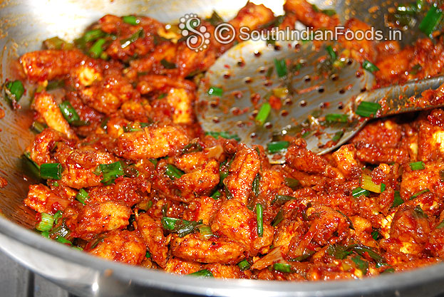 Add spring onion mix well & cut off heat
