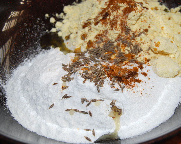 Add cumin seeds, oil