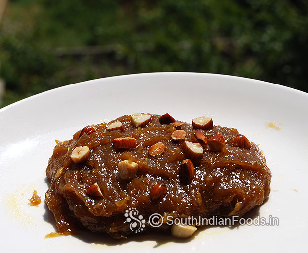 Pour banana halwa mixture to the ghee greased tray & let it cool