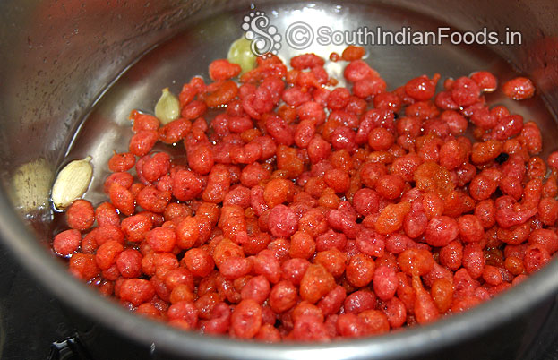 Add fried boondis into sugar syrup mix well, cover it, leave it for 2 min