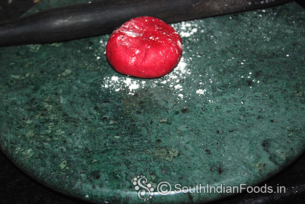 Sprinkle flour, roll out into thin chapathi