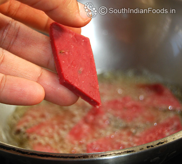 Heat enough oil in a pan, put raw beet nimkin