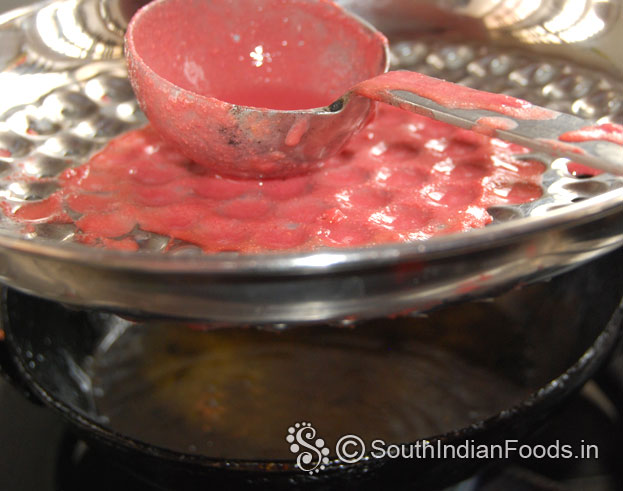 Heat oil hold bbondi ladle over the pan, pour beet gram flour batter, shake & deep fry