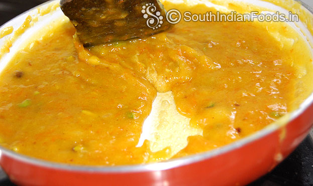 Carrot besan mixture almost ready stir for 2 min