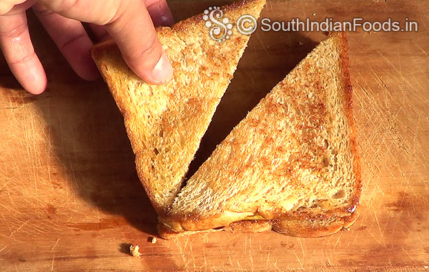 Cut brown bread into half triangle shape