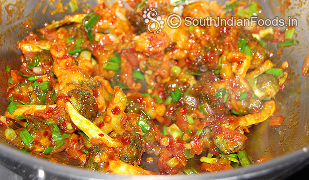 Add spring onion mix well then cut off heat