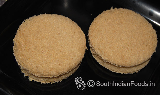 Cut brown bread into round shape then toast with ghee