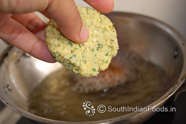 Heat oil put raw vada, deep fry till crisp and golden brown