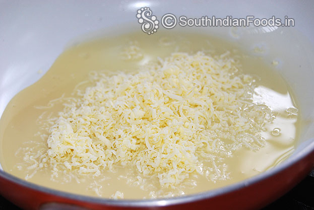 Heat sweet condensed milk in a pan, add grated paneer