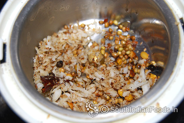 In a mixie jar, add roasted ingredients in a mixie jar, grind to fine paste