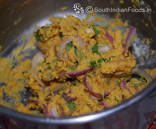 Add water slowly mix well, make pakoda soft sticky pakoda mixture